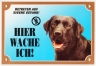 Schwarzer Labrador Retriever Warnschild